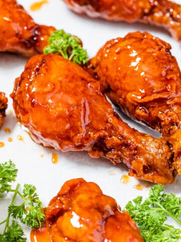 two fried chicken drumsticks