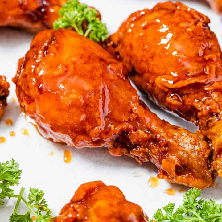 two fried chicken drumsticks