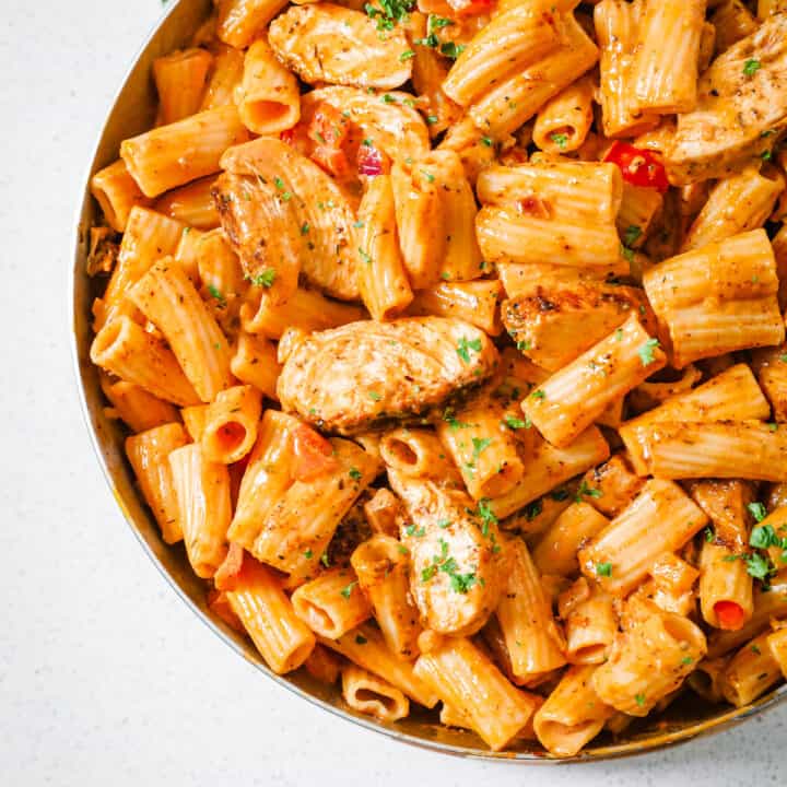 creamy pasta and chicken in a pan