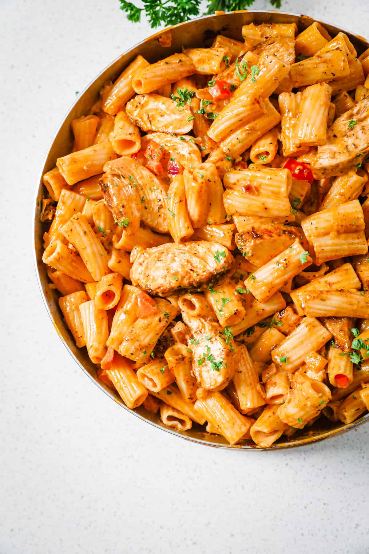 creamy pasta and chicken in a pan