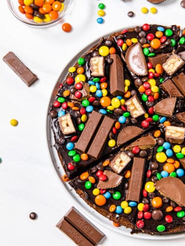 brownie pizza surrounded by halloween candy