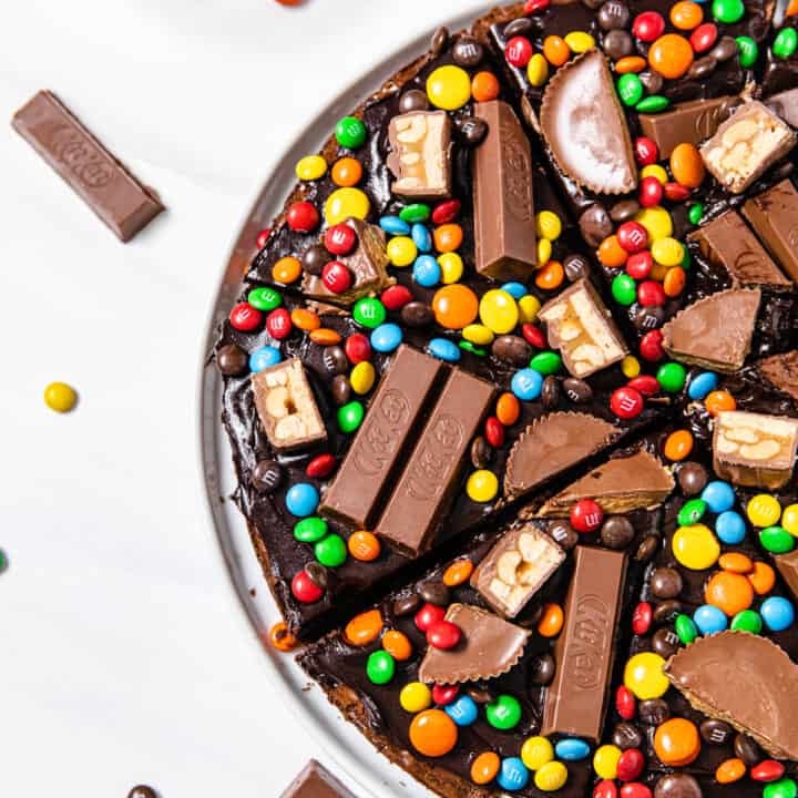 brownie pizza surrounded by halloween candy