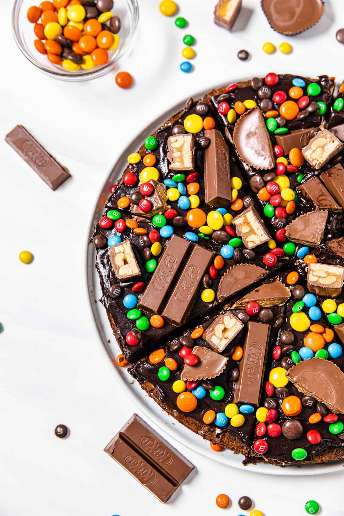 brownie pizza surrounded by halloween candy