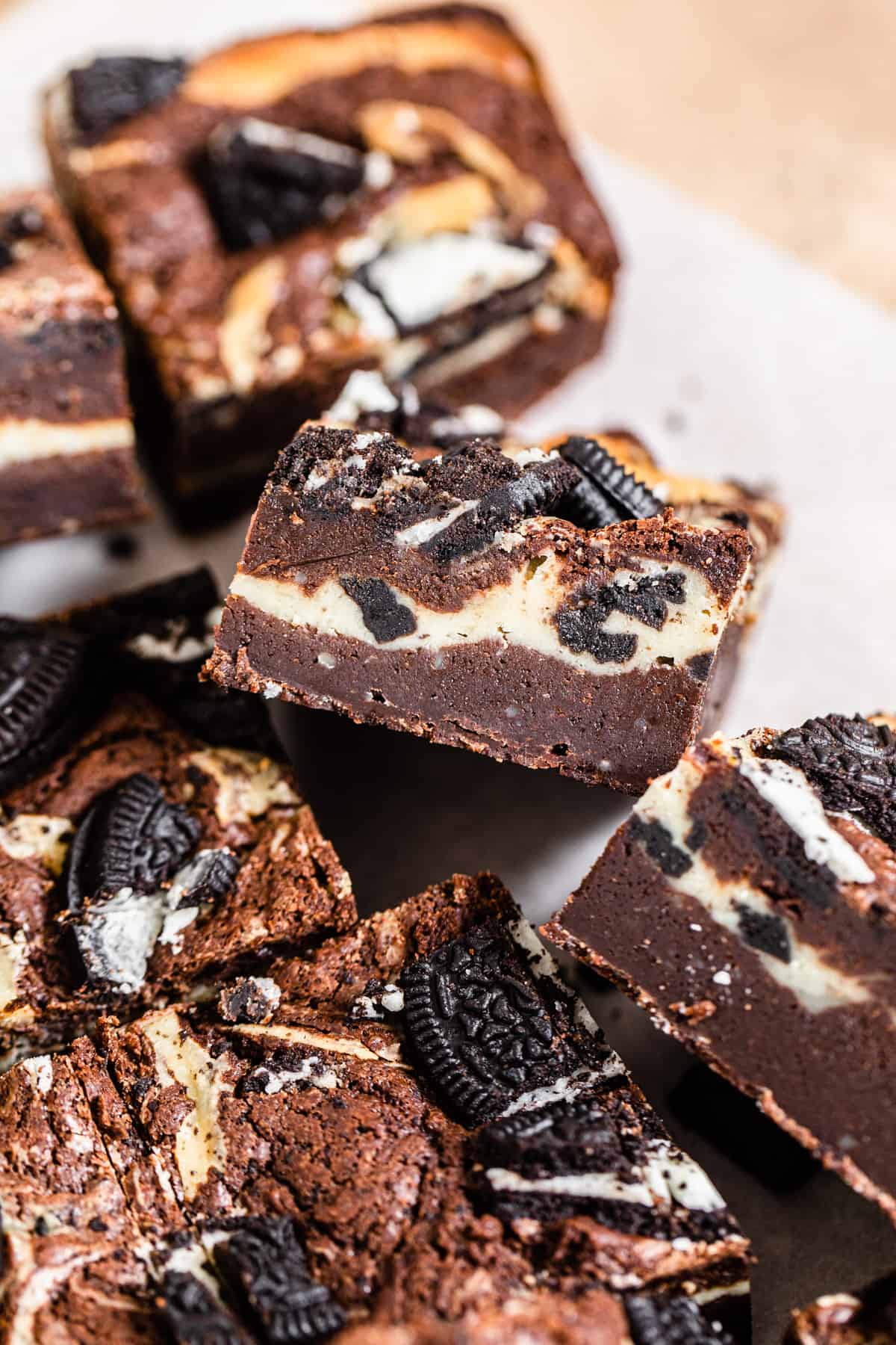close up of brownies stuffed with oreo cheesecake