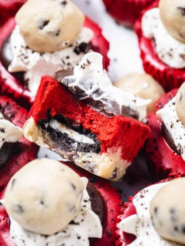 close up of red velvet cheesecake cupcake stuffed with Oreo